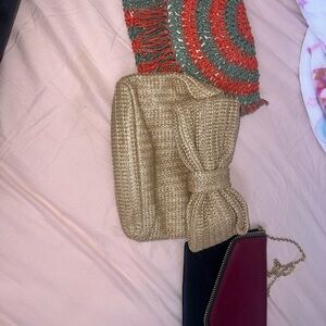 Chic Gold Woven Clutch with Bow Accent